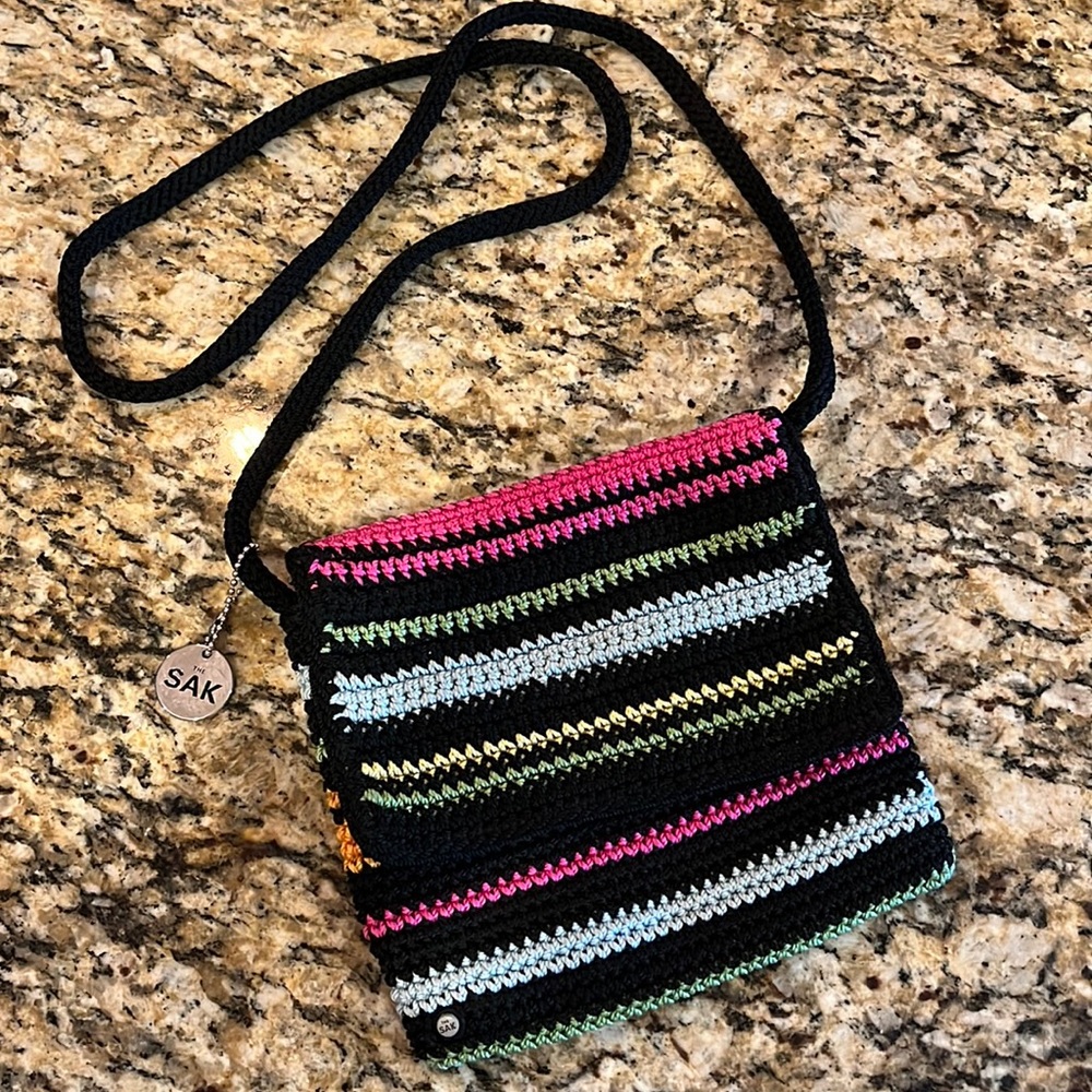 The SAK multicolored purse.